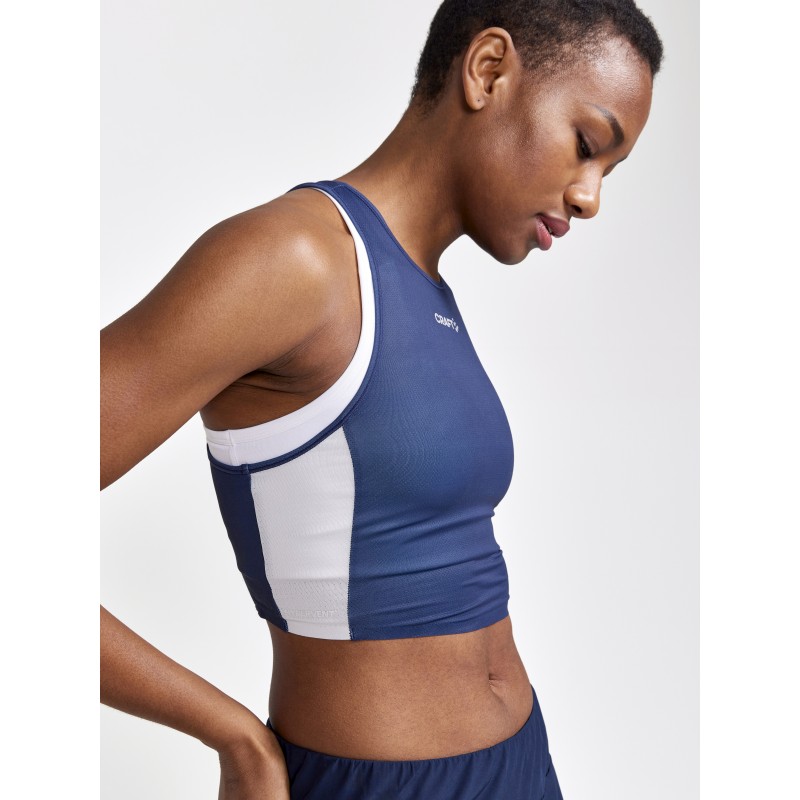 CRAFT ŽENSKA TEKAŠKA MAJICA BREZ ROKAVOV PRO HYPERVENT CROPPED TOP MODRA IN BELA BLAZE-FLEX