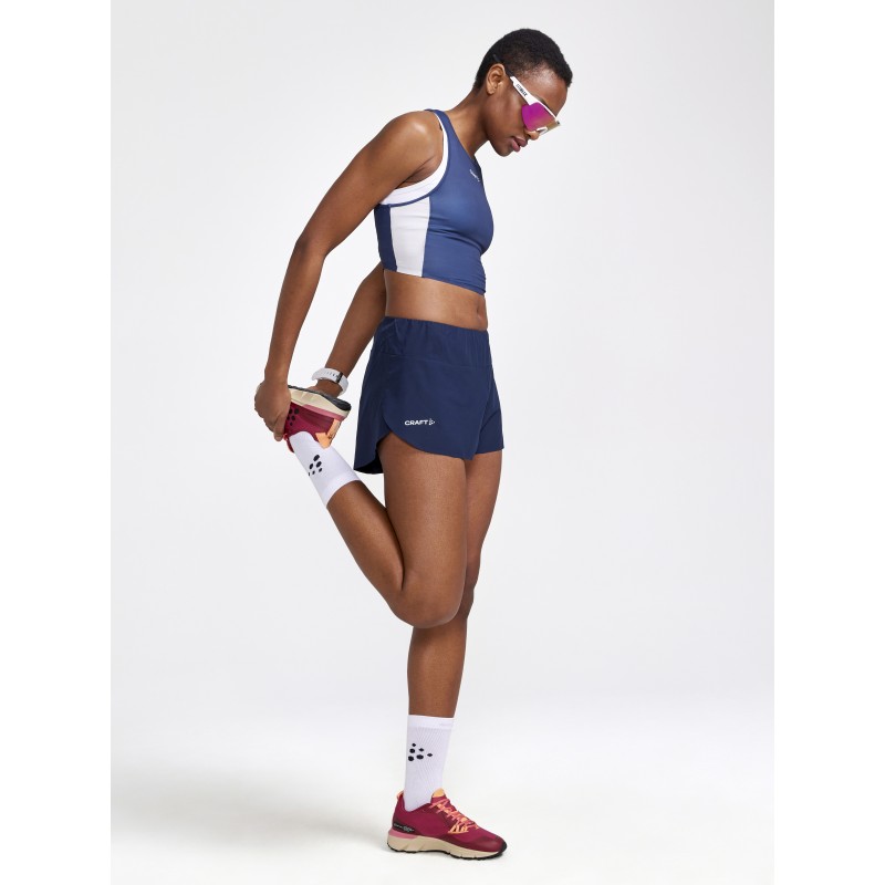 CRAFT ŽENSKA TEKAŠKA MAJICA BREZ ROKAVOV PRO HYPERVENT CROPPED TOP MODRA IN BELA BLAZE-FLEX