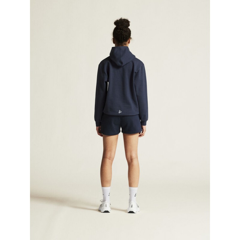 CRAFT ŽENSKI BOMBAŽEN PULOVER COMMUNITY 2.0. LOGO HOODIE NAVY