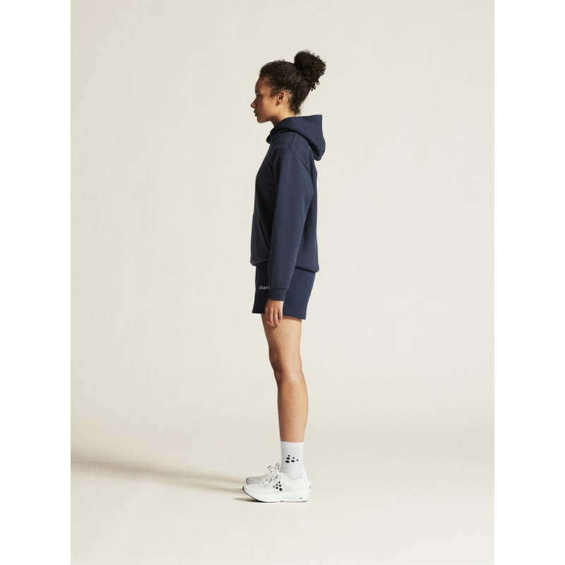 CRAFT ŽENSKI BOMBAŽEN PULOVER COMMUNITY 2.0. LOGO HOODIE NAVY
