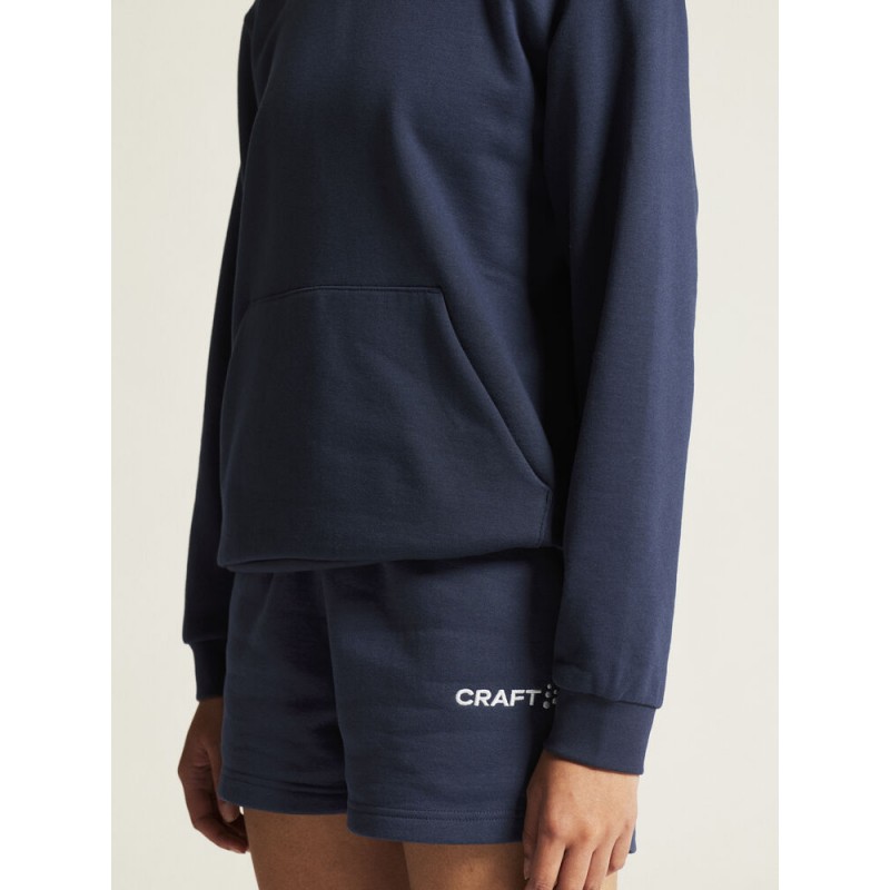 CRAFT ŽENSKI BOMBAŽEN PULOVER COMMUNITY 2.0. LOGO HOODIE NAVY