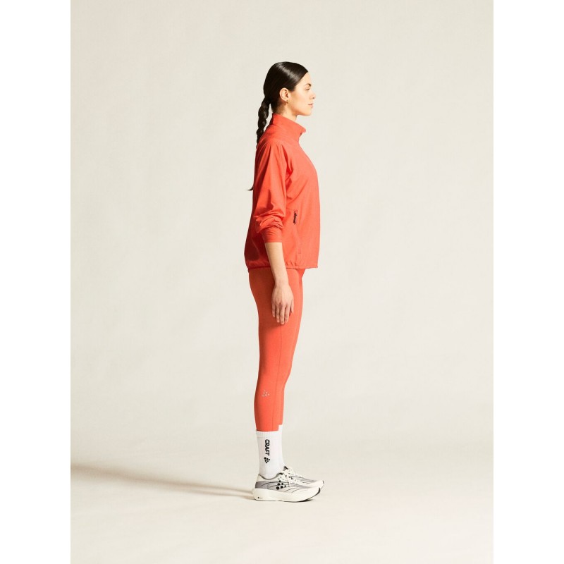 CRAFT ŽENSKA JAKNA/VETROVKA CORE ESSENCE WIND JACKET KORALNO ORANŽNA TRACE