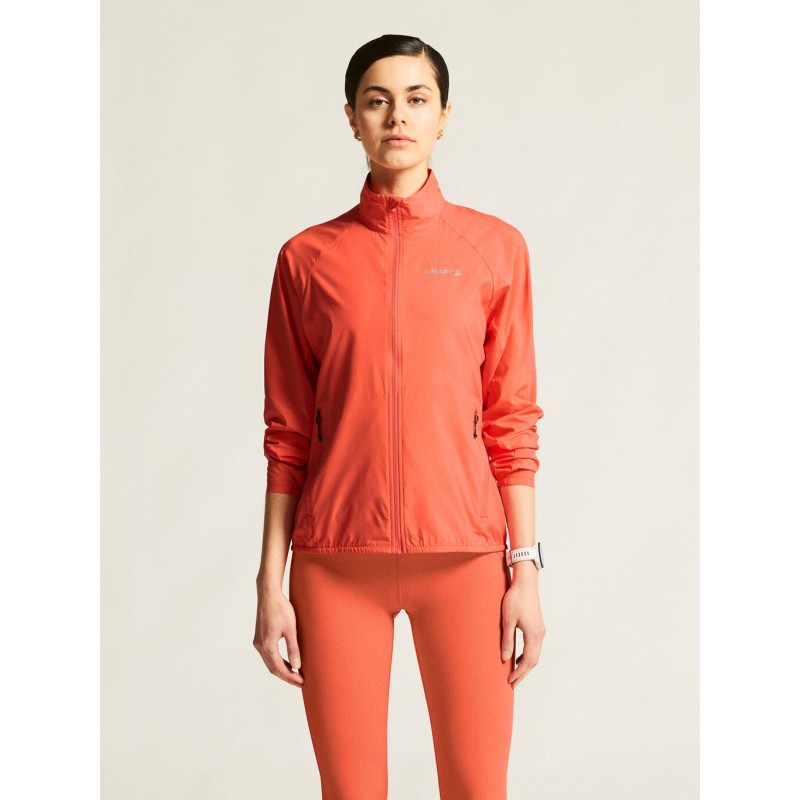 CRAFT ŽENSKA JAKNA/VETROVKA CORE ESSENCE WIND JACKET KORALNO ORANŽNA TRACE