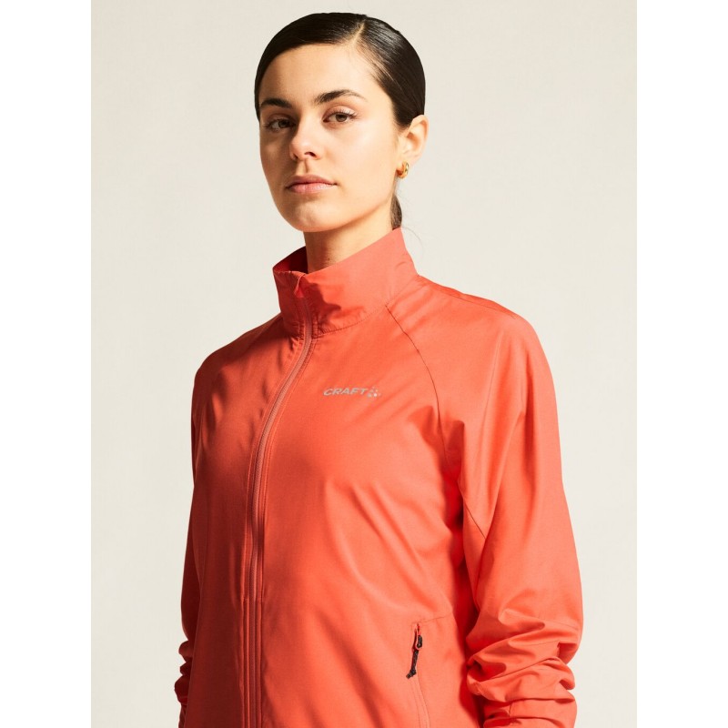 CRAFT ŽENSKA JAKNA/VETROVKA CORE ESSENCE WIND JACKET KORALNO ORANŽNA TRACE