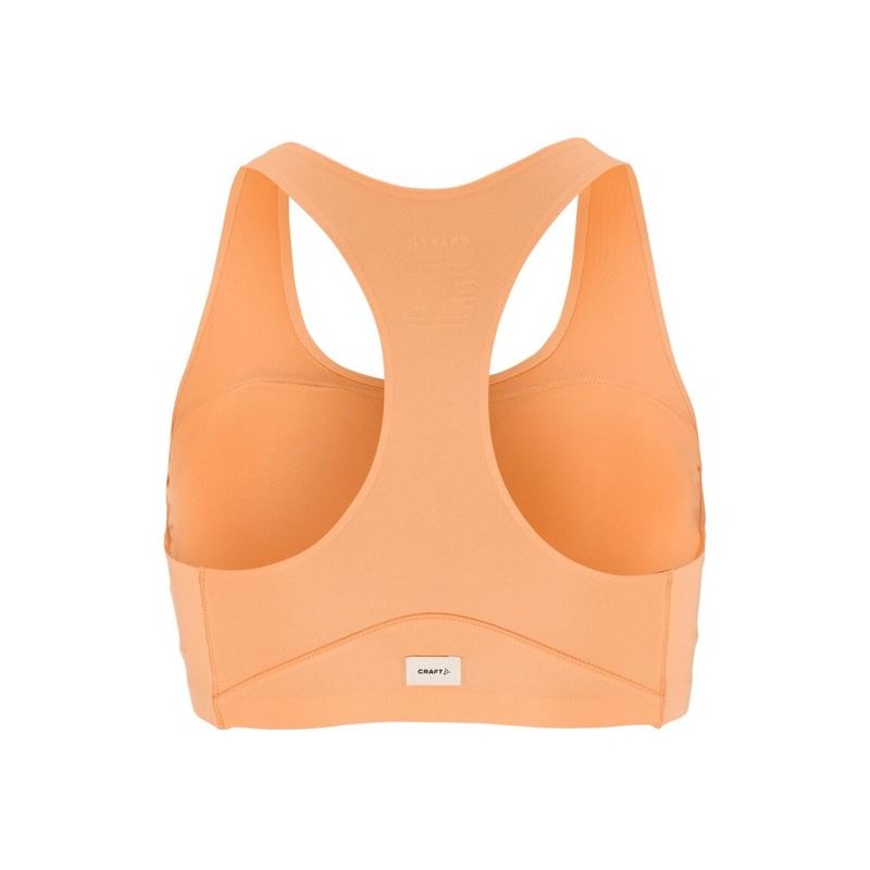CRAFT ŽENSKI ŠPORTNI PODLOŽEN NEDRČEK ADV COLLECTIVE PADDED SPORTSBRA MARELIČNA APRICOT