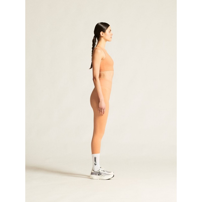 CRAFT ŽENSKI ŠPORTNI PODLOŽEN NEDRČEK ADV COLLECTIVE PADDED SPORTSBRA MARELIČNA APRICOT