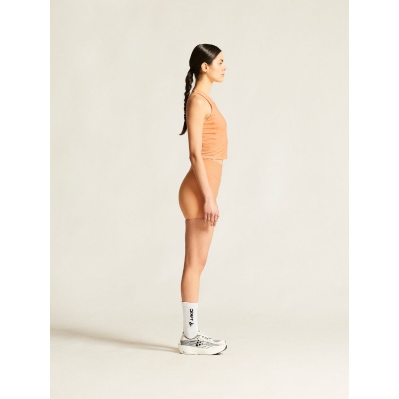 CRAFT ŽENSKA KRAJŠA MAJICA BREZ ROKAVOV ADV COLLECTIVE CROPPED SINGLET MARELIČNA APRICOT