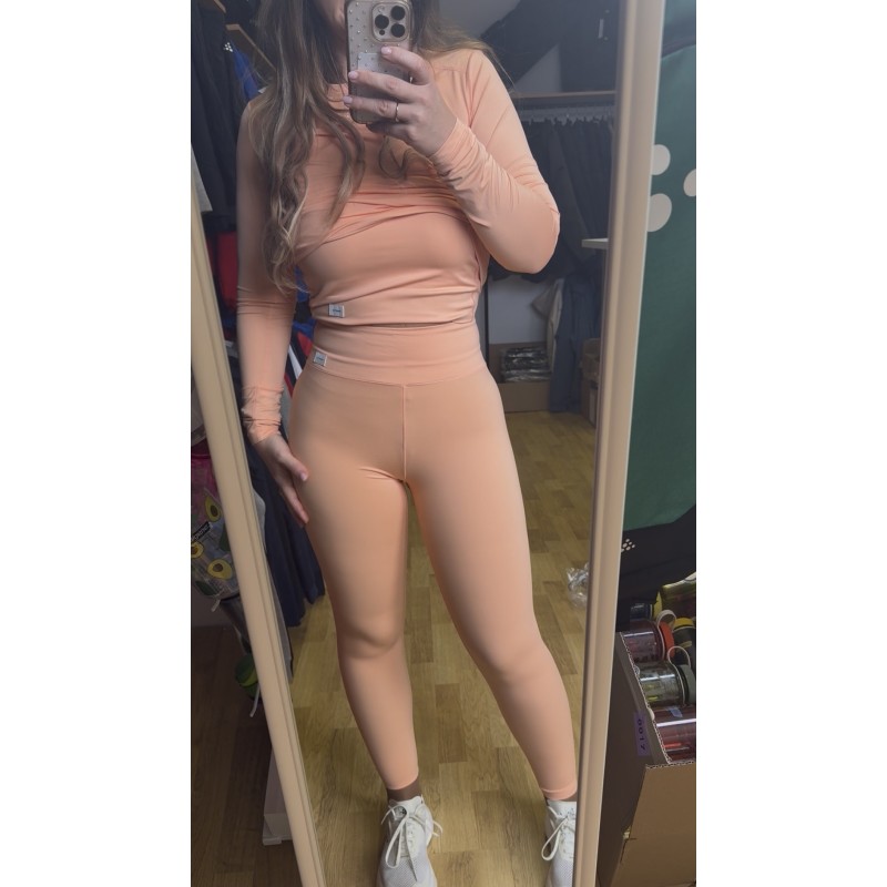 CRAFT ŽENSKA KRAJŠA MAJICA BREZ ROKAVOV ADV COLLECTIVE CROPPED SINGLET MARELIČNA APRICOT