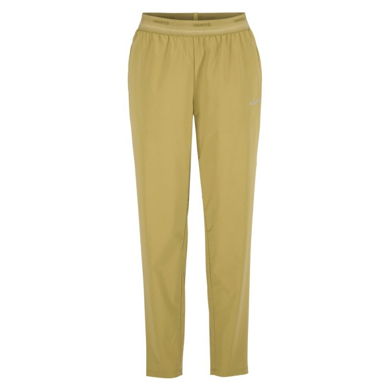 CRAFT ŽENSKE TEHNIČNE TANKE TRENING HLAČE ADV ESSENCE TRAINING PANTS 3 TEMNO RUMENA KHAKI