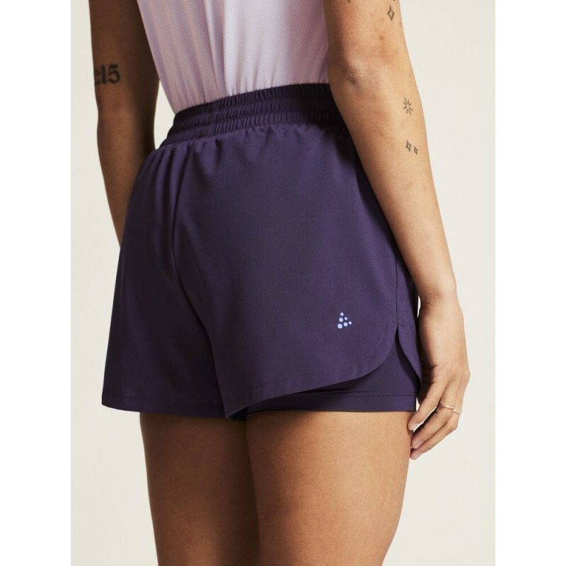 CRAFT ŽENSKE KRATKE HLAČE ADV ESSENCE 2-IN-1 SHORTS 2 TEMNO VIJOLIČNA DK PLUM