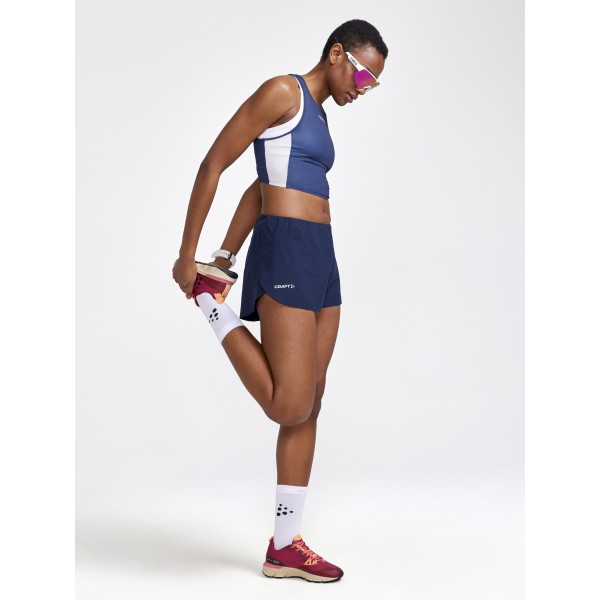 CRAFT ŽENSKA TEKAŠKA MAJICA BREZ ROKAVOV PRO HYPERVENT CROPPED TOP MODRA IN BELA BLAZE-FLEX