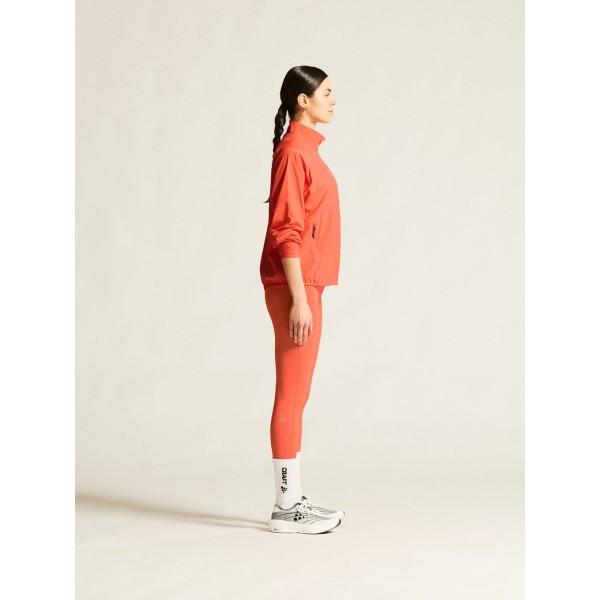 CRAFT ŽENSKA JAKNA/VETROVKA CORE ESSENCE WIND JACKET KORALNO ORANŽNA TRACE
