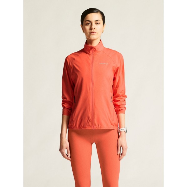 CRAFT ŽENSKA JAKNA/VETROVKA CORE ESSENCE WIND JACKET KORALNO ORANŽNA TRACE