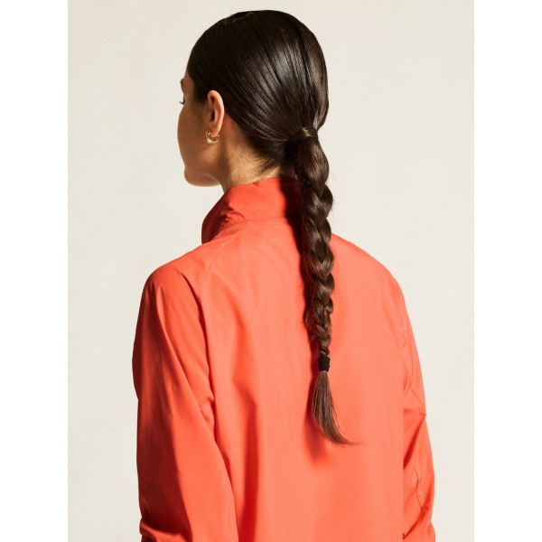 CRAFT ŽENSKA JAKNA/VETROVKA CORE ESSENCE WIND JACKET KORALNO ORANŽNA TRACE