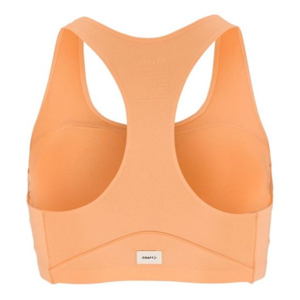 CRAFT ŽENSKI ŠPORTNI PODLOŽEN NEDRČEK ADV COLLECTIVE PADDED SPORTSBRA MARELIČNA APRICOT
