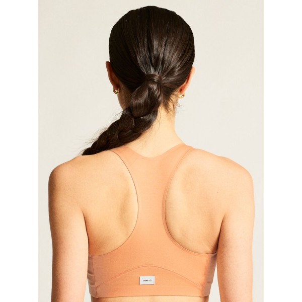 CRAFT ŽENSKI ŠPORTNI PODLOŽEN NEDRČEK ADV COLLECTIVE PADDED SPORTSBRA MARELIČNA APRICOT