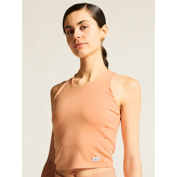 CRAFT ŽENSKA KRAJŠA MAJICA BREZ ROKAVOV ADV COLLECTIVE CROPPED SINGLET MARELIČNA APRICOT