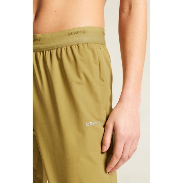 CRAFT ŽENSKE TEHNIČNE TANKE TRENING HLAČE ADV ESSENCE TRAINING PANTS 3 TEMNO RUMENA KHAKI