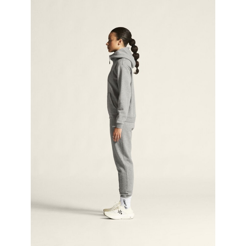 CRAFT ŽENSKA BOMBAŽNA JOPICA Z ZADRGO COMMUNITY 2.0. LOGO FZ HOODIE GREY MELANGE