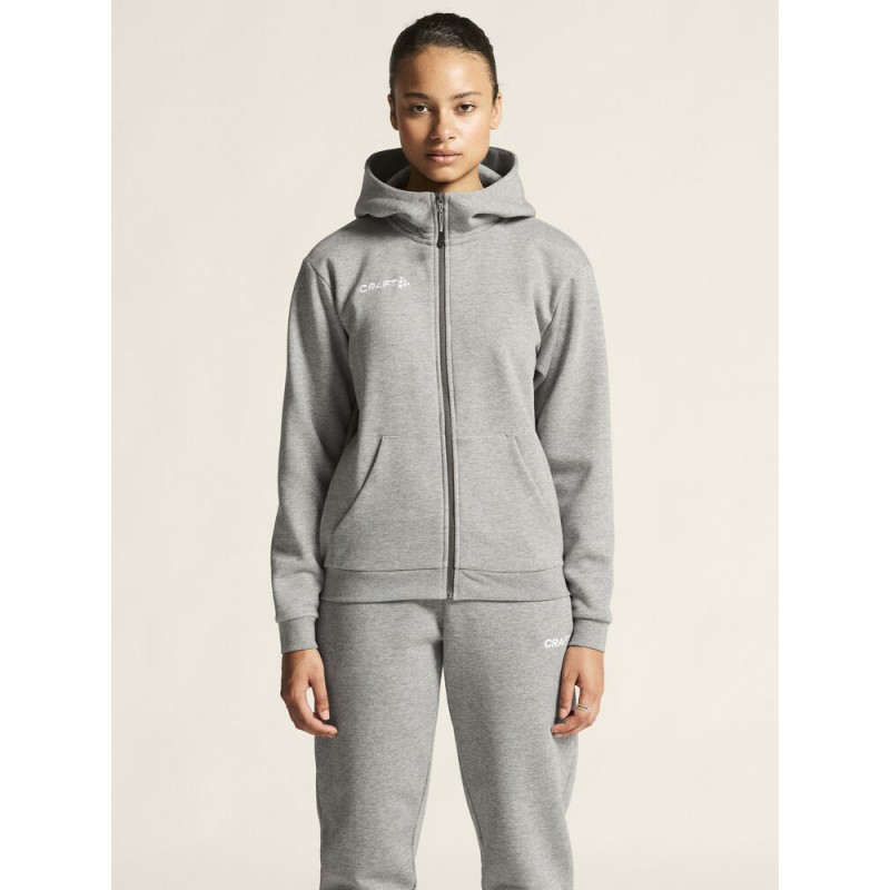 CRAFT ŽENSKA BOMBAŽNA JOPICA Z ZADRGO COMMUNITY 2.0. LOGO FZ HOODIE GREY MELANGE