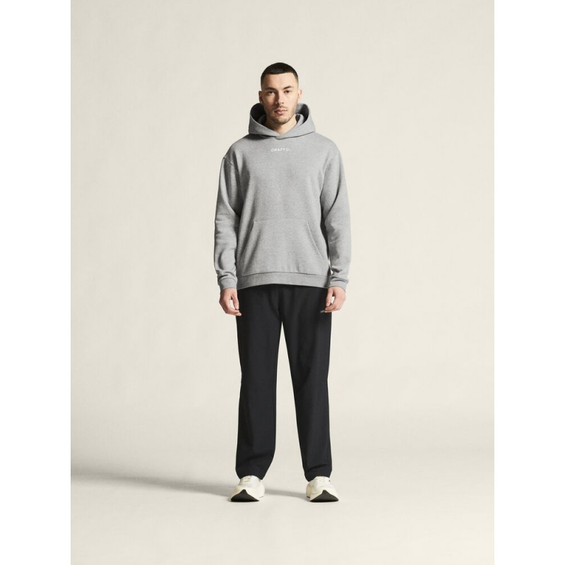CRAFT MOŠKI BOMBAŽEN PULOVER COMMUNITY 2.0. LOGO HOODIE GREY MELANGE