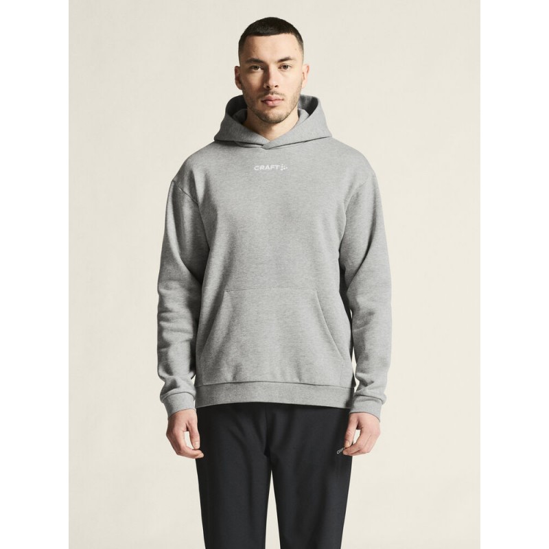 CRAFT MOŠKI BOMBAŽEN PULOVER COMMUNITY 2.0. LOGO HOODIE GREY MELANGE