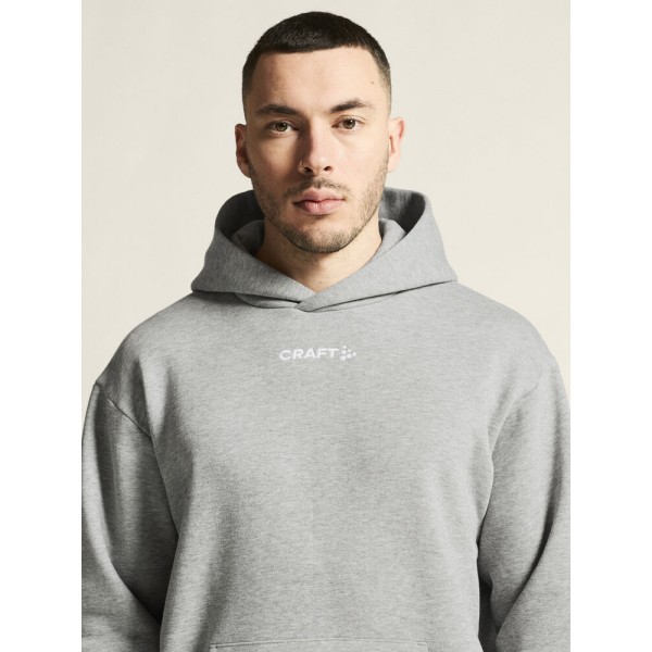 CRAFT MOŠKI BOMBAŽEN PULOVER COMMUNITY 2.0. LOGO HOODIE GREY MELANGE
