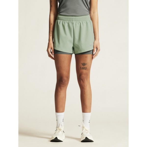 CRAFT ŽENSKE KRATKE HLAČE ADV ESSENCE 2-IN-1 SHORTS 2 GLACIAL